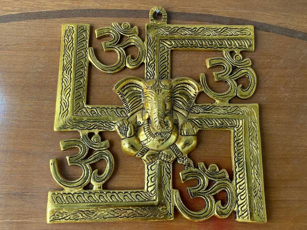 istock Lord Ganesha and om Swastik Wall Hanging 1387705190
