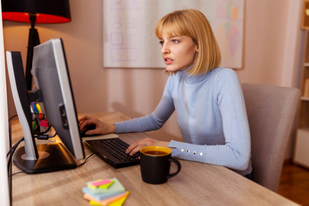istock Female web designer working in home office 1387706834
