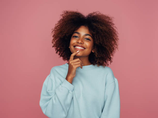 istock Beautiful girl with curly hairstyle 1387710116