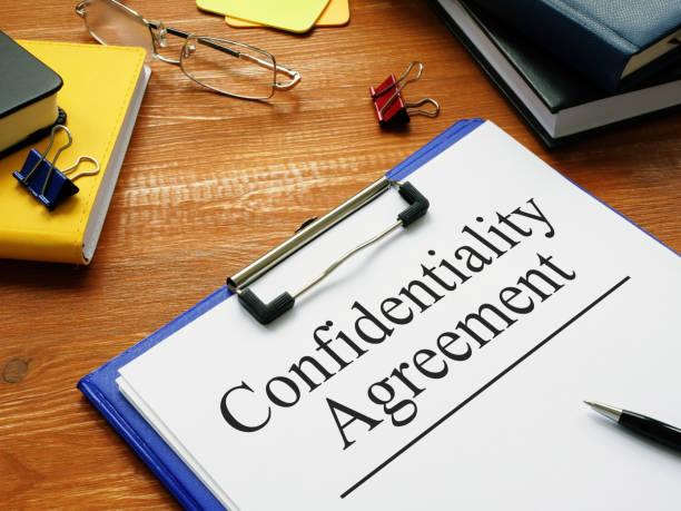 istock Confidentiality agreement is shown on the photo using the text 1387710118