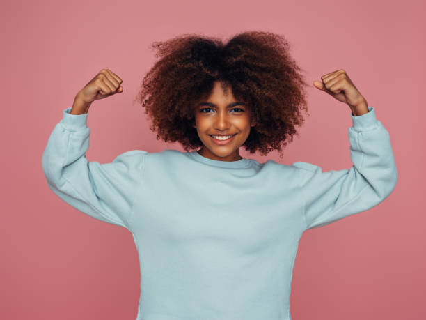 istock Beautiful girl with curly hairstyle 1387710156