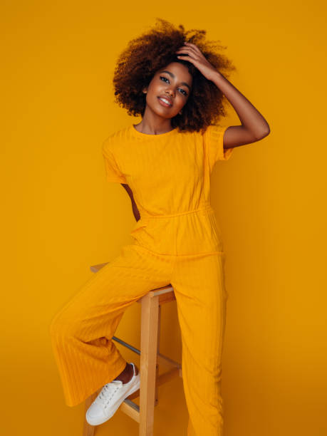 istock Beautiful girl with curly hairstyle 1387710280