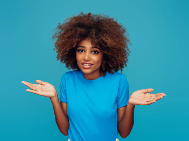 istock Beautiful afro woman 1387710365