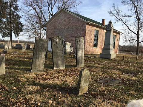 Old country church in a cemetery.