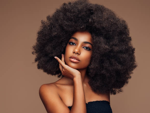 istock Beautiful girl with curly hairstyle 1387711072