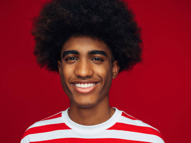 istock Portrait of afro guy 1387711269