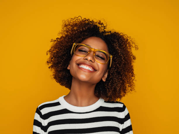 istock Beautiful afro woman 1387711300