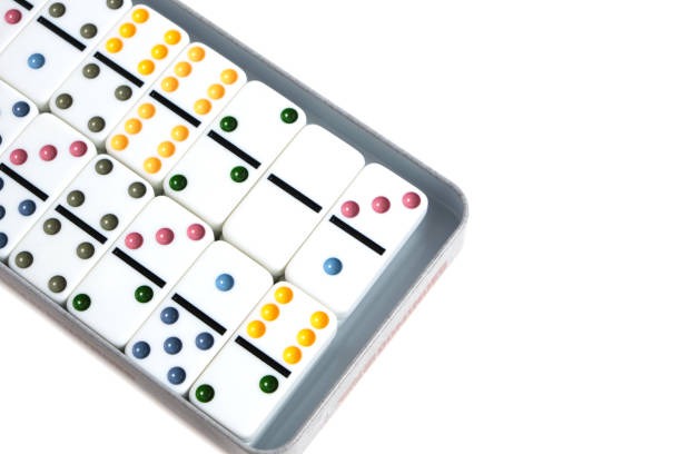 istock Dominoes with colorful coloring white background in package. 1387718552