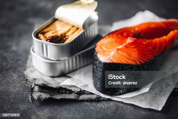 Raw Salmon Steak With Canned Sardine Stock Photo - Download Image Now - Salmon - Seafood, Canned Food, Can