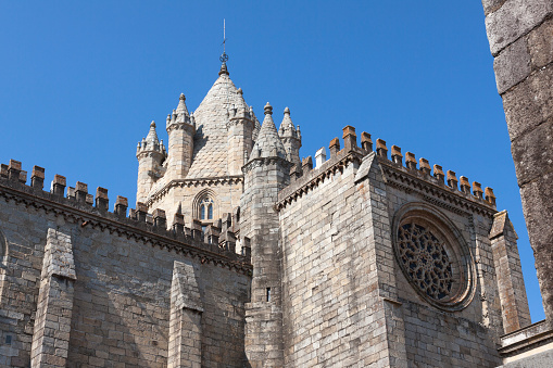 Evora cathedral. Low angle, wide angle view of the cathedral taken from the inner courtyard.