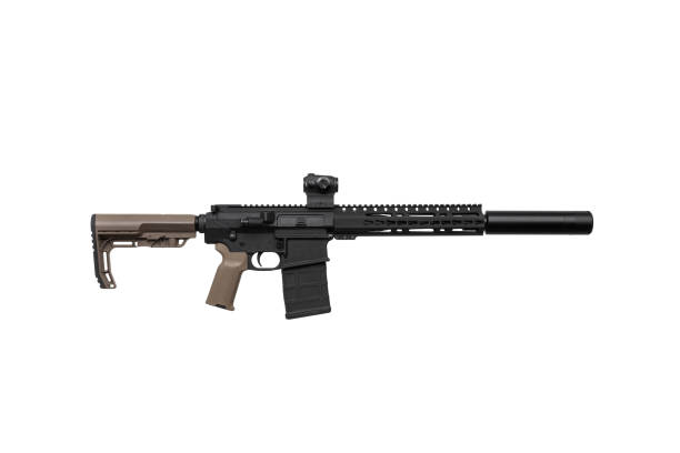 istock Modern automatic rifle isolated on white background. Weapons for police, special forces and the army. A carbine with red dot sight and silencer on a white background. 1387735475