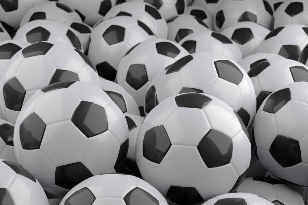 istock Black and white soccer balls background. 3d illustration. 1387739717