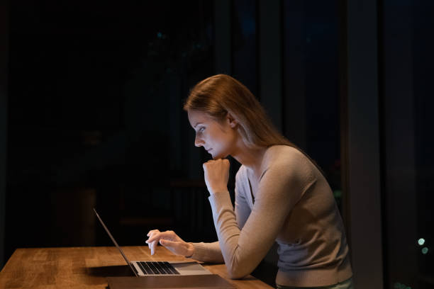 istock Happy motivated young businesswoman working on computer. 1387743750