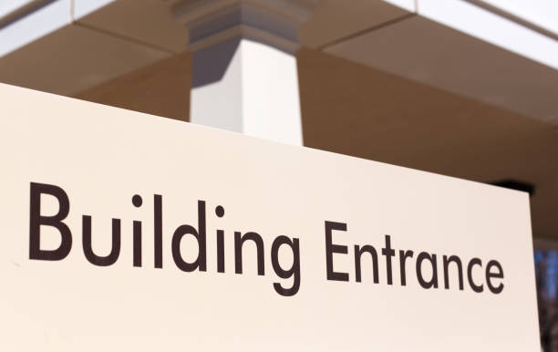 istock Close-Up Sunlit Sign Reading 