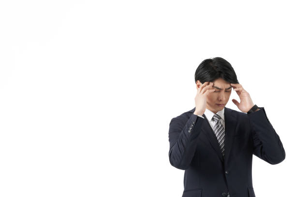 istock Asian businessman who fails and regrets 1387748968
