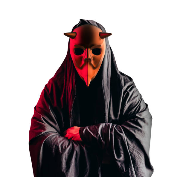 istock Occult horror sectarian with metal mask on white background. 1387752200