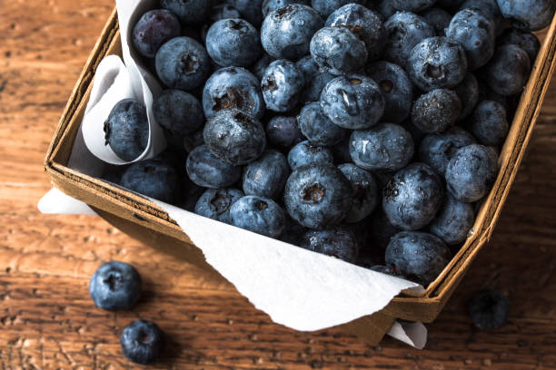 Fresh Blueberries in Wood Pint Basket stock photo