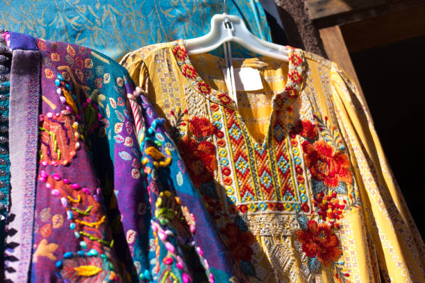 istock Santa Fe, NM: Ethnic Embroidered Blouses Outside Retail DIsplay 1387753098