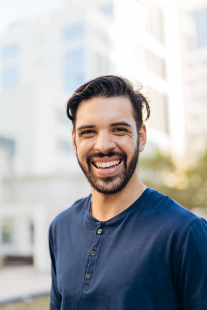 istock Portrait of a smiling businessman 1387753784