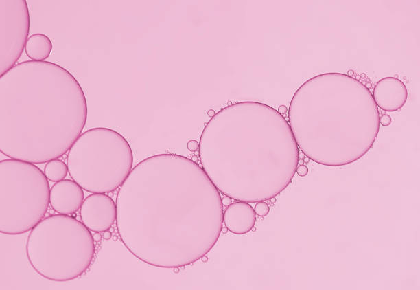 istock Abstract oil droplets on water created bubble  pattern and circles shape. 1387757857