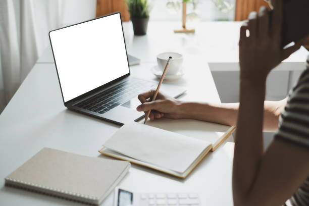 istock E-learning ,online ,education and internet social distancing protect from COVID-19 viruses concept. Asian woman student video conference e-learning with teacher on laptop at home. 1387768755