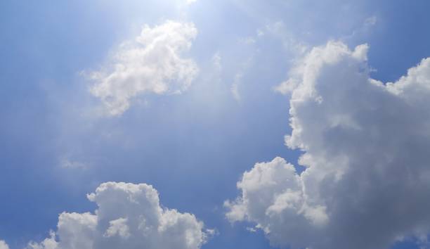 istock Sunshine​ White​ clouds​ in the​ blue sky​ Cloudy natural background 1387773335