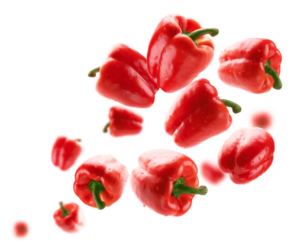 istock Red paprika levitates on a white background 1387774123