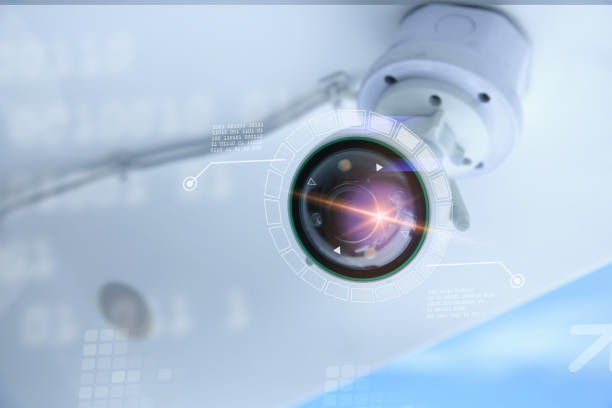 istock Close up of CCTV camera over defocused background. 1387775332