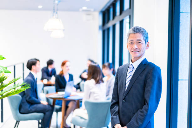 Elderly businessperson working with a smile