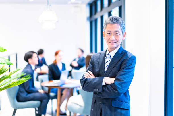 istock Elderly businessperson working with a smile 1387775514