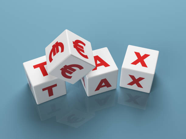 istock Red-colored euro symbol and white-colored cubes. 1387776141