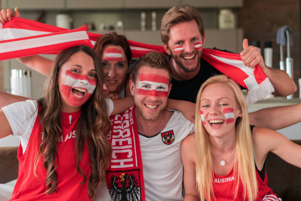Austrian fans cheering at home for their team