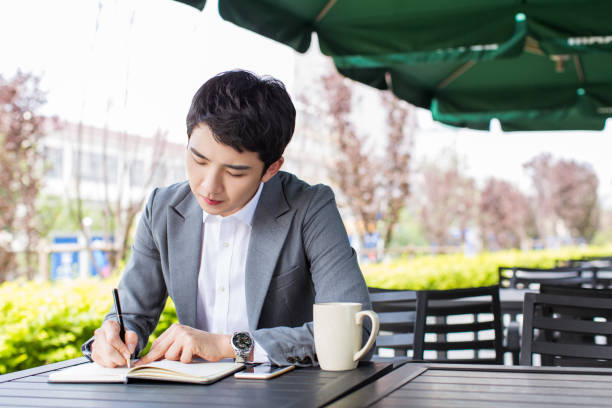 istock young chinese businessman, IT elite 1387777136