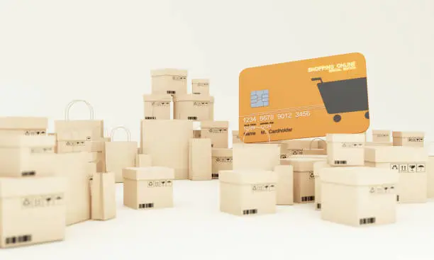 Photo of the concept of online shopping with shopping bag, cardboard box, box, shopping online design on template mock up yellow Bank credit card isolate on white background 3d rendering illustration