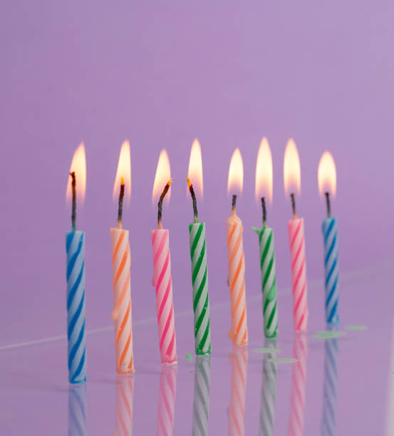 istock birthday candles on purple background 1387779643