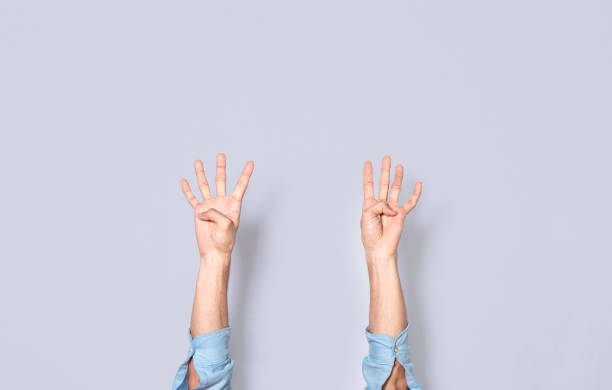 istock Man hands counting four, fingers counting four, hand fingers counting four on isolated background, countdown 1387782203