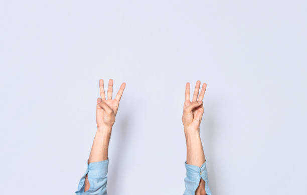 istock Hands counting three, fingers counting three, hand fingers counting three on isolated background, countdown 1387782221