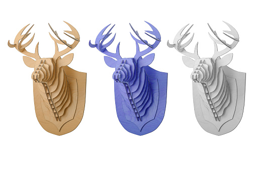 Wooden deer made of plywood against a white isolated background. A set of three options for painting plywood.