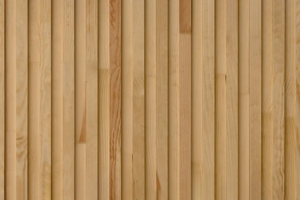istock Seamless pattern of modern wall covering with vertical wooden slats for background 1387782968