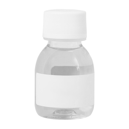 transparent chemical solution in a plastic bottle, isolated on a white background