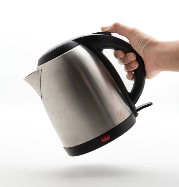 istock Silver Electric Kettle isolated on a white background. 1387789213