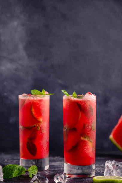Watermelon alcoholic or non-alcoholic cocktail, mojito cocktail with mint and lime. stock photo