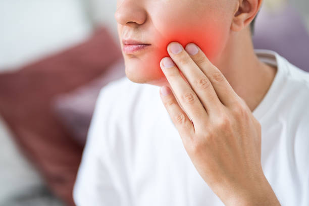 istock A man with toothache, periodontal disease in wisdom teeth 1387792720