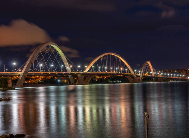 istock Owl on post with illuminated bridge behind in Brasilia 1387793506