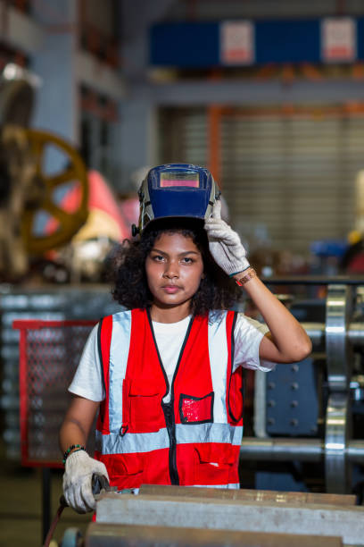istock Foreman or worker work at factory site check up machine or products in site. Engineer or Technician checking Material or Machine on Plant. Industrial and Factory. 1387804590