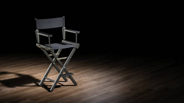 istock Director Chair in the spotlight. 3d rendering 1387806348