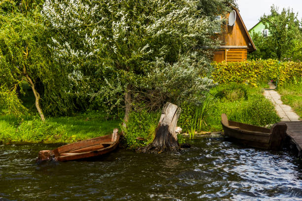 istock old wooden boat on the lake 1387806400