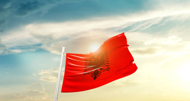 istock Australia flag waving on beautiful sky. 1387808172