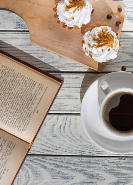 istock breakfast with cakes and coffee on a white wooden table. Spring breakfast. 1387809343
