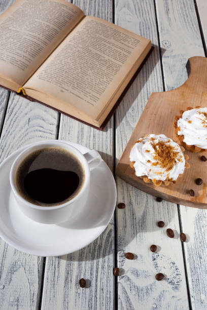 istock breakfast with cakes and coffee on a white wooden table 1387809859